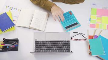 Time lapse view of man doing calculations. video