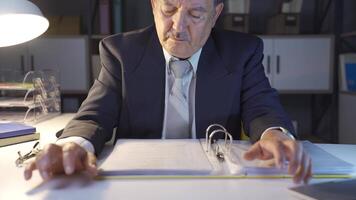 Stressed and thoughtful businessman working. video