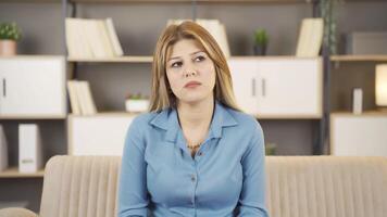 Frustrated woman thoughtful at home. video