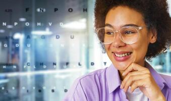 Happy woman with new eyeglasses to fix poor eyesight photo