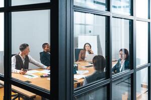 Team of people work together on company statistics in office as teamwork and partnership concept photo