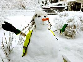 A snowman outside the house after a heavy snowfall in digital painting style photo