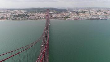 Aerial View Traffic in 25 de Abril Bridge over the River Tejo. Lisbon, Portugal video