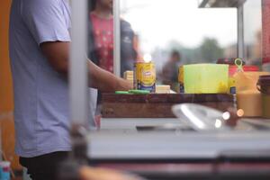 Magelang,Indonesia.01,01,2024-Selective focus. Making a Malaysian Dessert,roti bakar. The process of making sweet roti bakar photo