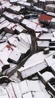 Vertical Video Village of Pitoes das Junias in Portugal Covered with Snow after Storm