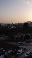 Vertical Video of Eletrician Working in the Pillow at Sunset Aerial View