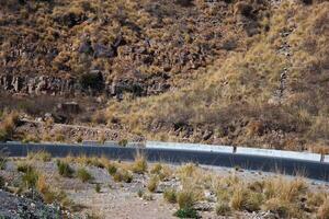 a road in the mountain , this road is known as quetta road, rakhi gaj steel bridge is famous in the world its a new wonder in constriction in Pakistan on 2023-09-25 photo