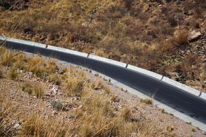 a road in the mountain , this road is known as quetta road, rakhi gaj steel bridge is famous in the world its a new wonder in constriction in Pakistan on 2023-09-25 photo