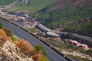 a road in the mountain , this road is known as quetta road, rakhi gaj steel bridge is famous in the world its a new wonder in constriction in Pakistan on 2023-09-25 photo