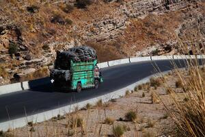 a road in the mountain , this road is known as quetta road, rakhi gaj steel bridge is famous in the world its a new wonder in constriction in Pakistan on 2023-09-25 photo