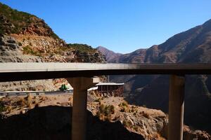 a road in the mountain , this road is known as quetta road, rakhi gaj steel bridge is famous in the world its a new wonder in constriction in Pakistan on 2023-09-25 photo