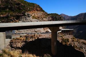 a road in the mountain , this road is known as quetta road, rakhi gaj steel bridge is famous in the world its a new wonder in constriction in Pakistan on 2023-09-25 photo