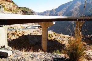 a road in the mountain , this road is known as quetta road, rakhi gaj steel bridge is famous in the world its a new wonder in constriction in Pakistan on 2023-09-25 photo