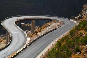 a road in the mountain , this road is known as quetta road, rakhi gaj steel bridge is famous in the world its a new wonder in constriction in Pakistan on 2023-09-25 photo