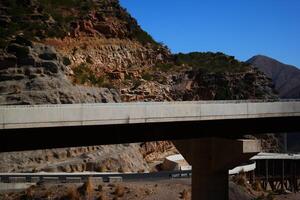 a road in the mountain , this road is known as quetta road, rakhi gaj steel bridge is famous in the world its a new wonder in constriction in Pakistan on 2023-09-25 photo