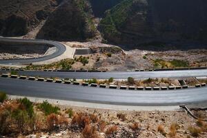 a road in the mountain , this road is known as quetta road, rakhi gaj steel bridge is famous in the world its a new wonder in constriction in Pakistan on 2023-09-25 photo