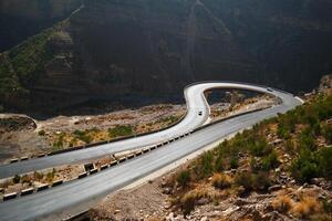 a road in the mountain , this road is known as quetta road, rakhi gaj steel bridge is famous in the world its a new wonder in constriction in Pakistan on 2023-09-25 photo