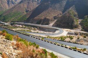 a road in the mountain , this road is known as quetta road, rakhi gaj steel bridge is famous in the world its a new wonder in constriction in Pakistan on 2023-09-25 photo