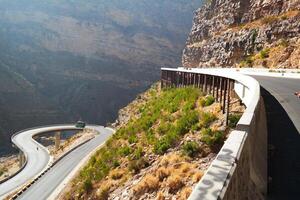 a road in the mountain , this road is known as quetta road, rakhi gaj steel bridge is famous in the world its a new wonder in constriction in Pakistan on 2023-09-25 photo