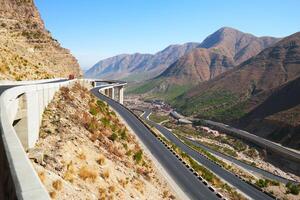 a road in the mountain , this road is known as quetta road, rakhi gaj steel bridge is famous in the world its a new wonder in constriction in Pakistan on 2023-09-25 photo