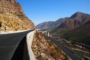 a road in the mountain , this road is known as quetta road, rakhi gaj steel bridge is famous in the world its a new wonder in constriction in Pakistan on 2023-09-25 photo