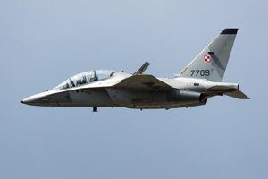 Radom, Poland, 2023 - Polish Air Force Leonardo M-346 Master Bielik trainer jet plane flying. Aviation and military aircraft. photo