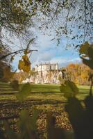 Medieval Walzin Castle on the banks of the River Lesse in the Wallonia region of southern Belgium. Gothic Revival castle stands on a steep rock in the province Namur photo