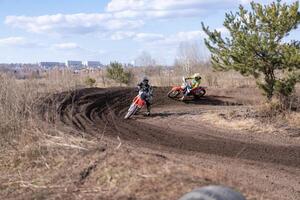 Kharkov. Ukraine March 2021 Moto cross training Enduro bike ride off road track photo