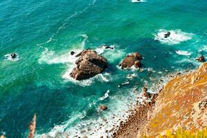 Atlantic ocean view with cliff. View of Atlantic Coast at Portugal, Cabo da Roca. Summer day photo