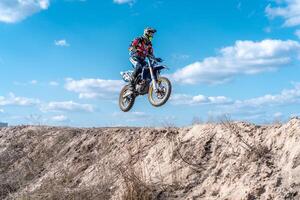 Kharkov. Ukraine March 2021 Moto cross training Enduro bike ride off road track photo