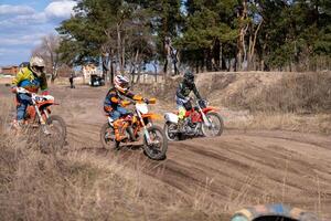 Kharkov. Ukraine March 2021 Moto cross training Enduro bike ride off road track photo