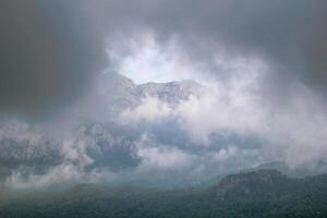 View on Sivri Dag mountain in thunder weather. One of the most famous places for climbing and hiking in Turkey, Antalya. photo