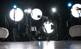 A Man Assembling Powerful Modern LED Video and Photo Lighting