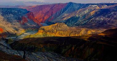 Amazing scenery of china mountains and blue sky background in sunset. Zhangye Danxia National Geopark, Gansu, China. Colorful landscape, rainbow hills, unusual colored rocks, sandstone erosion photo