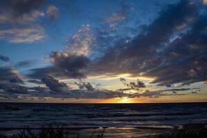 Sunset o the Baltic Sea in Lithuania photo