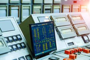 Electrical control panel with buttons and levers. Nuclear power. photo