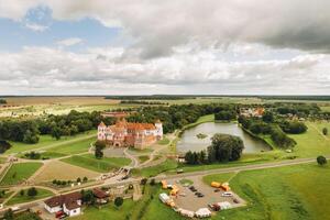 View from the height of the Mir Castle in Belarus and the park on a summer day.Belarus photo