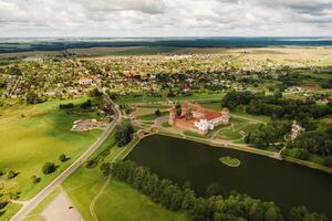 View from the height of the Mir Castle in Belarus and the park on a summer day.Belarus photo