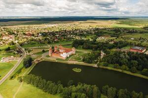 View from the height of the Mir Castle in Belarus and the park on a summer day.Belarus photo