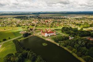 View from the height of the Mir Castle in Belarus and the park on a summer day.Belarus photo