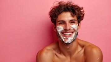 ai generado retrato de un hermoso joven hombre con afeitado espuma en su cara en un rosado antecedentes foto