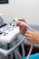 Ultrasound machine, ultrasonography. Medical equipment, healthcare concept. Selective focus photo