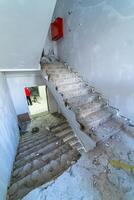 View at the stairs at the repair period. Building at the house. Full length. Stock photo