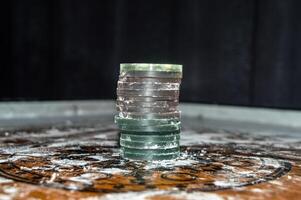 balls or discs stacked on a carrom game board with a sprinkling of flour photo