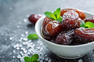 AI generated dried dates dipped in sugar syrup photo