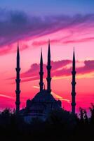 AI generated Majestic Sunset Behind Mosque Minarets in Tranquil Evening. photo