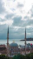 Istanbul background photo. Nusretiye Mosque and Galataport from Cihangir. photo