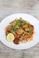 Garden Fresh Vegetable Pad Thai pasta noodles served in a dish isolated on grey background side view photo