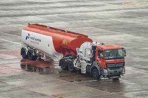 Pertamina's Mercedes tank truck transporting aviation fuel at Juanda International Airport, Surabaya, Indonesia, 6 January 2024 photo