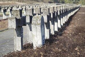 Palmiry, Poland - March 3rd, 2024 - Cross tombstones at Cemetery and Memorial photo